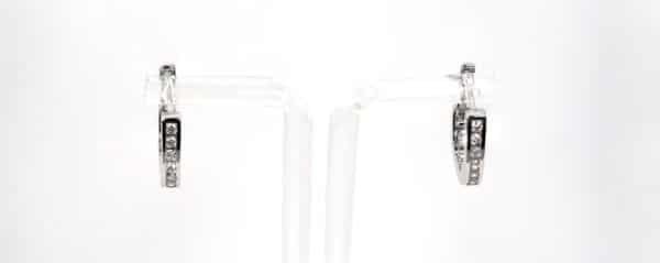 Sparkling Sterling Silver Huggie Earrings Adorned with Zircon Stones - Image 3