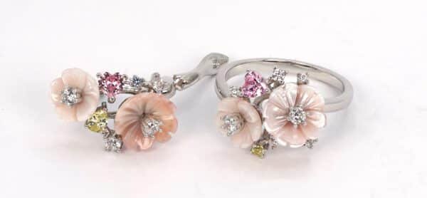 Adorn yourself with the elegant Rose Gold Zircon Set, featuring delicate Sterling Silver floral motifs and shimmering zircon stones for a blooming beauty that will captivate all eyes