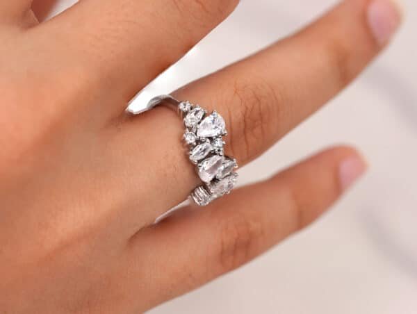 Stunning Sterling Silver Ring with 3 Large Oval Zircon Stones and 9 Unique Smaller Stone Shapes - A Must-Have Jewelry Piece
