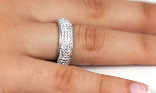 Stunning Sterling Silver Ring with Four Lines of Sparkling Zircon Stones Encircling