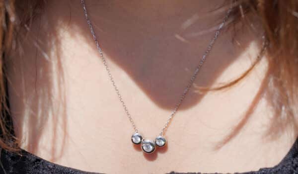 Sparkling Sterling Silver Necklace with 3 Zircon-Studded Circles"