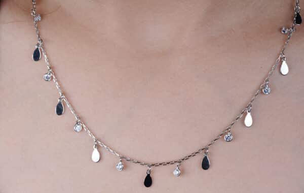 Sterling Silver Necklace with Elegant Hanging Ovals and Zircon-Studded Circle Pendant