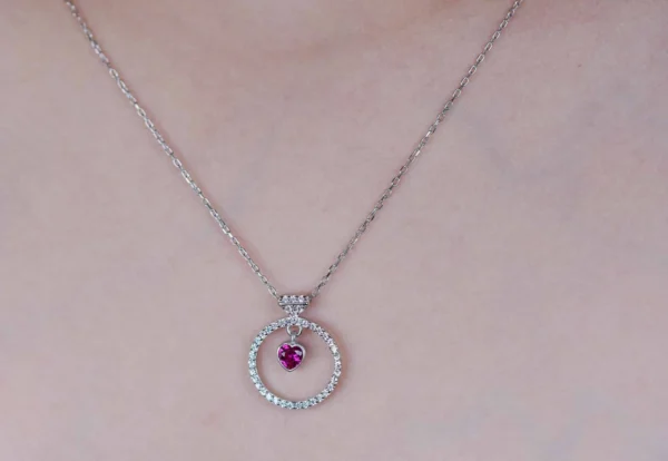 Stunning Sterling Silver Necklace with Zircon-Studded Circle and Heart-Shaped Pink Gemstone Pendant - Image 3