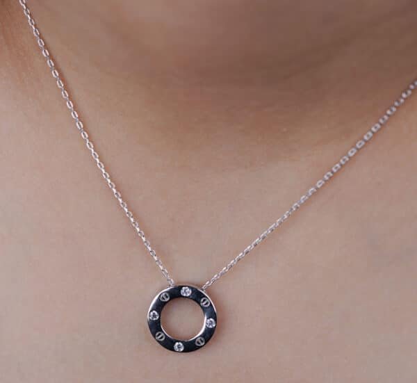 Sparkling Sterling Silver Circle Necklace with Stamped Zircon Stones: A Stunning Addition to Your Jewelry Collection