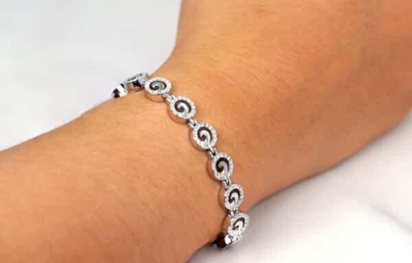 Sterling Silver Circle-Shaped Tennis Bracelet with Cubic Zircon Stones and Intricate Wave Design