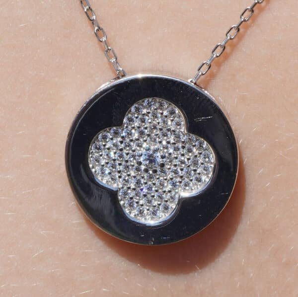 Sterling Silver Circle Necklace with Intricate Flower Design and Zircon Stone Accents - Image 2