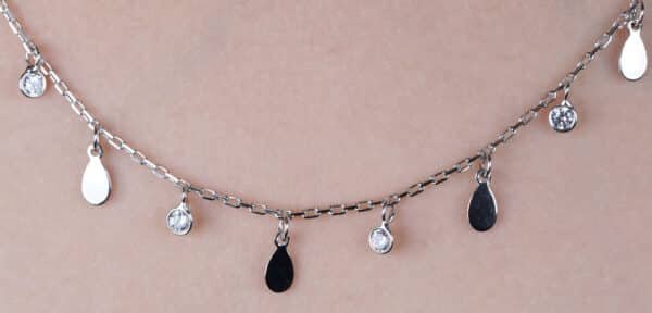Sterling Silver Necklace with Elegant Hanging Ovals and Zircon-Studded Circle Pendant - Image 2