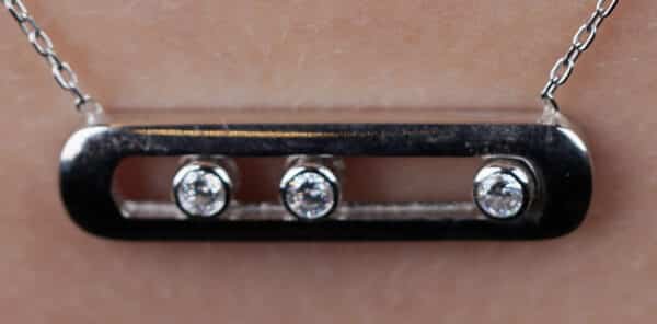 Stunning Sterling Silver Necklace with Movable Track and 3 Sparkling Zircon Stones - Image 2