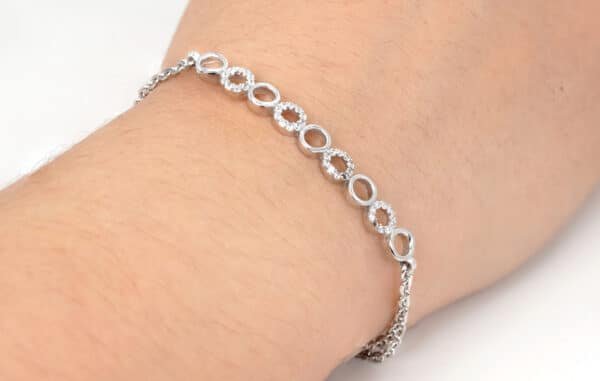 Stunning Sterling Silver Bracelet with 9 Circle Design - Featuring a Chic Combination of Plain and Zircon Stone Circles