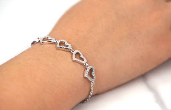 Elegant Sterling Silver Bracelet with 5 Heart Charms - 3 adorned with Zircon Stones and 2 Polished Silver Hearts Adjustable