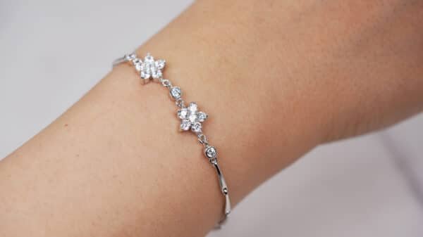 Floral and Geometric Zircon Sterling Silver Bracelet with Cornet Accents