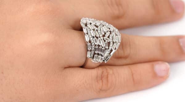 Radiant Sterling Silver Ring with a Dazzling Stream of Zircon Stones