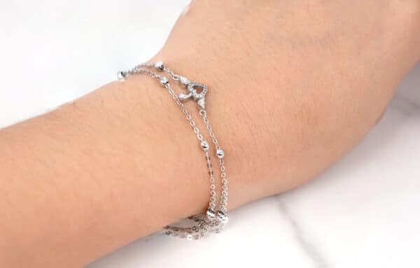 Stunning Sterling Silver Bracelet with Heart-Shaped Apple Stem Design and Chic Silver Beads unique design