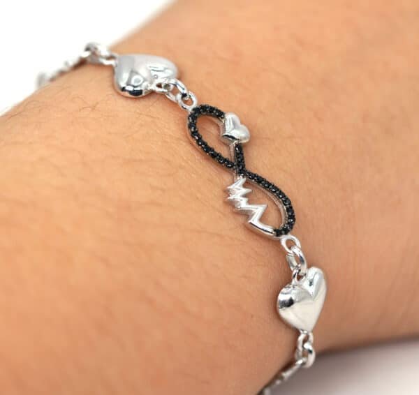 Forever Symbol Sterling Silver Bracelet with Heartbeat and Connected Hearts Design, Featuring Intricate Silver Chain with Multiple Shapes - Image 4