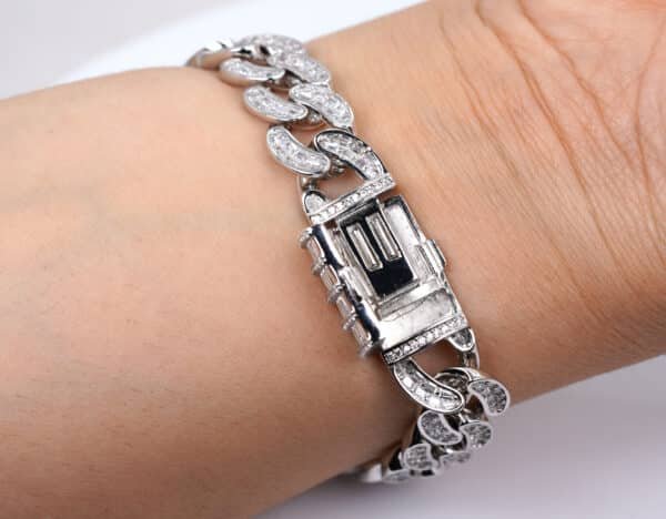 Bold and Glamorous Sterling Silver Bracelet with Sparkling Zircon Stones and Secure Locking Clasp - Image 2