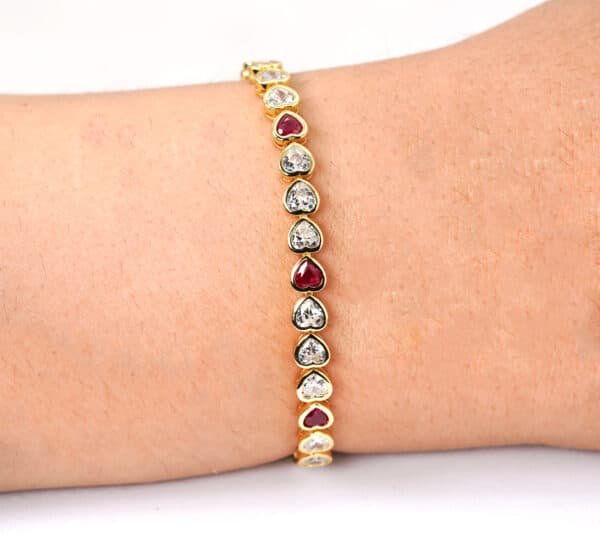 Golden Heart Linked Sterling Silver Tennis Bracelet with 34 Zircon-Studded Hearts, Featuring Dazzling Fuchsia and Diamond Shades