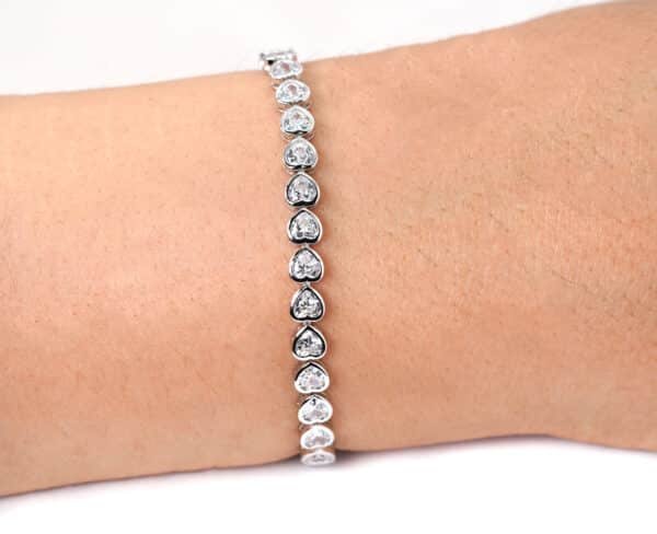 Sparkling Heart-Linked Sterling Silver Tennis Bracelet with 34 Zircon Stones