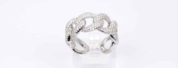 Sterling Silver Ring with Zircon Stones and Free-Hanging Chain Design - Image 4