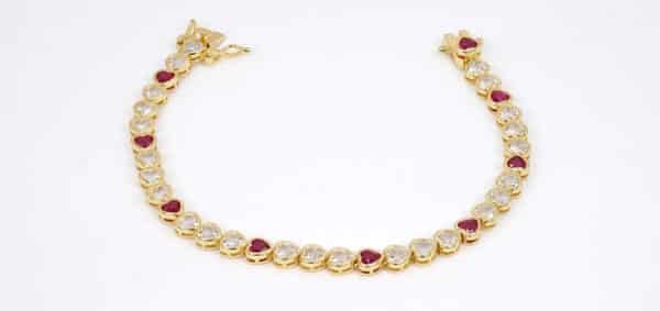 Golden Heart Linked Sterling Silver Tennis Bracelet with 34 Zircon-Studded Hearts, Featuring Dazzling Fuchsia and Diamond Shades - Image 4